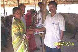 Disbursing wages to the beneficiaries at Casuarina Bay (North Andaman)